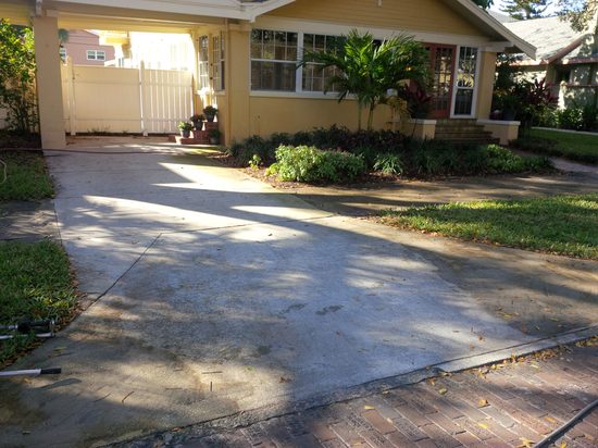 Driveway before pressure washing